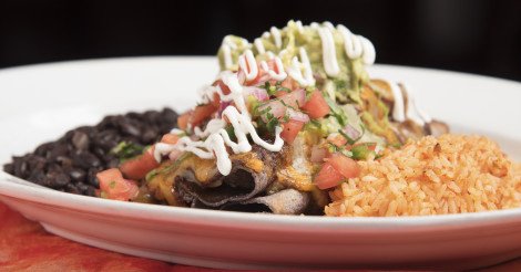 MojaveNYC's tweet photo. Ordering chicken is no longer boring! Chicken Mole Enchilada https://t.co/LfAdqKkqzN