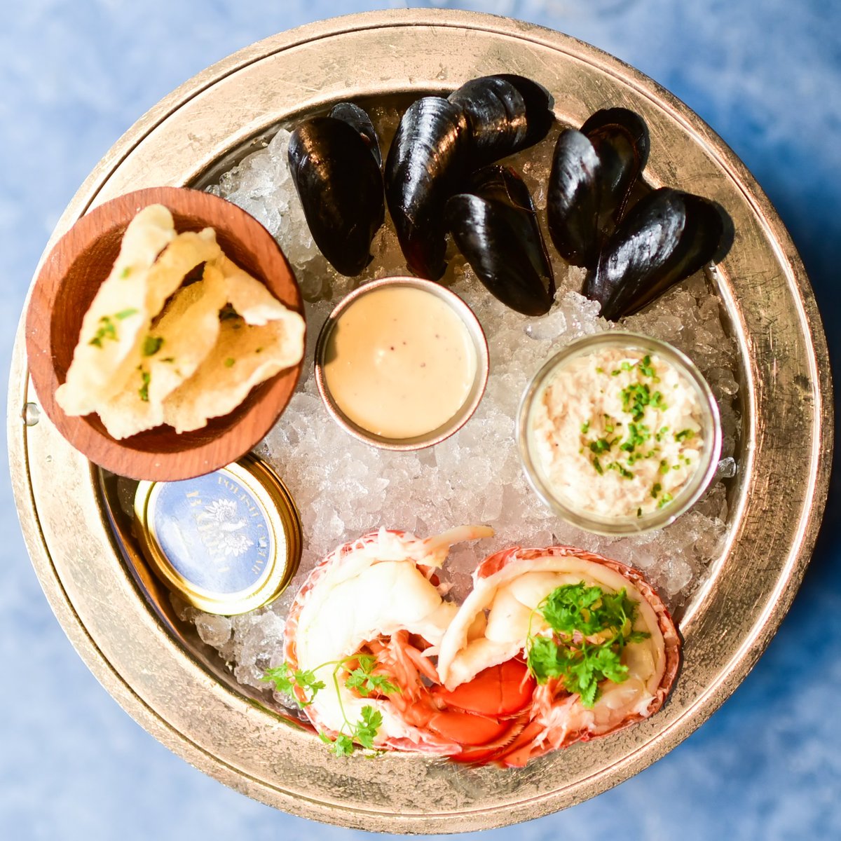 New offering from the R&amp;D department here at B&amp;G: chilled lobster tail joins house favorites smoked mussels and crabmeat cocktail on the shellfish a la carte. Oh, and some caviar service too! It fit in the ice and we were starving...
