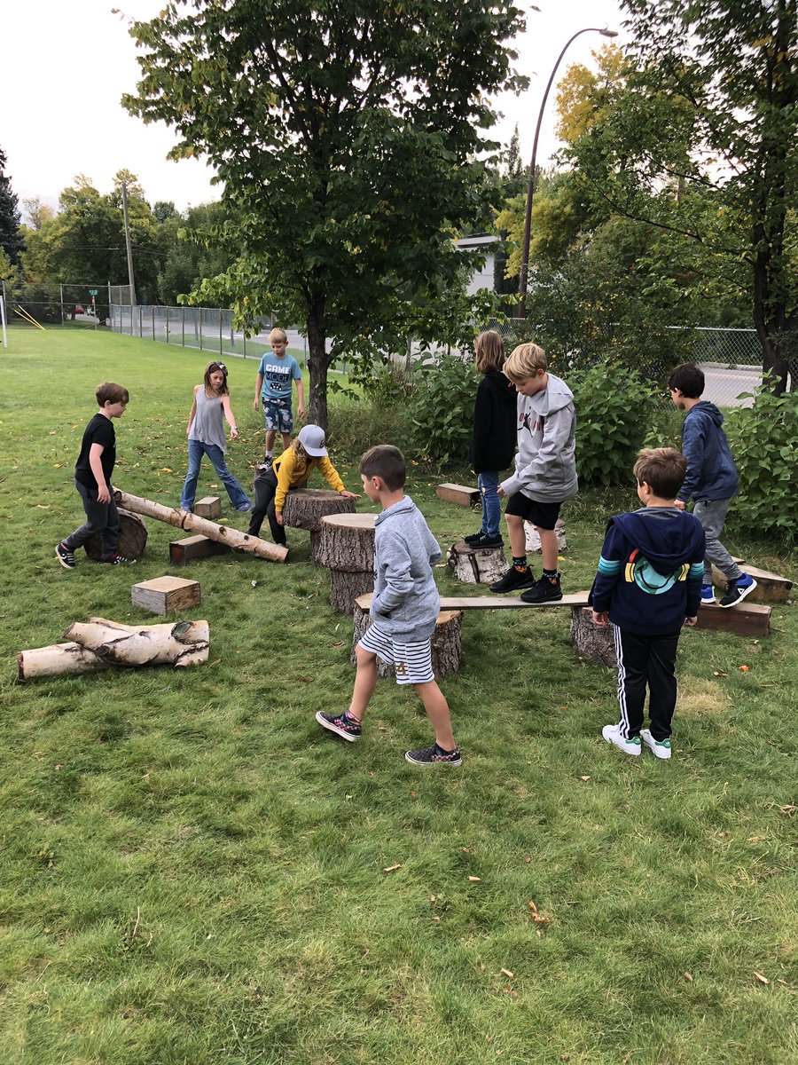FechJason's tweet photo. Who needs a big fancy playground? Give us stumps and planks and we’ll make our own @ElbowParkSchool! #letthemplay #timbernook https://t.co/GvTftgx9RB