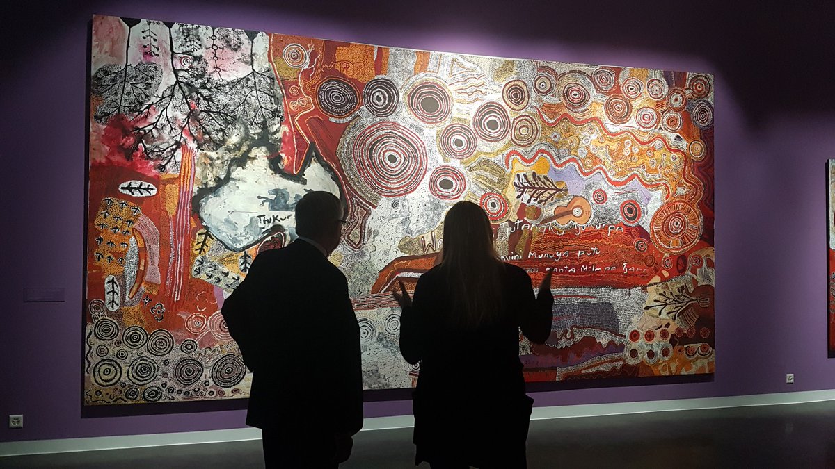 AustraliaUN_GVA's tweet photo. Extremely proud to host @KenWyattMP, the first indigenous Minister for Indigenous Australians. An honour to open his visit to Geneva at @FondationOpale's extraordinary exhibition of indigenous artwork #Beforetimebegan, featuring incredible art from @apyacc and other communities https://t.co/8LTbTUWsTW