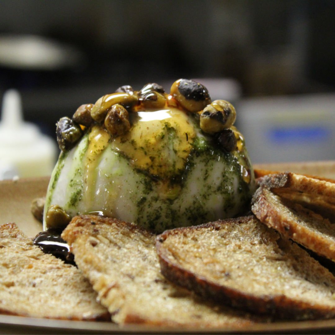 'Ain’t no mountain (of Burrata) high enough. 🤤 Served with caramelized figs, hot honey, roasted pistachio &amp; crostini.
.
.
.
#hamont #hamonteats #hamontrestos #hamiltonfoodie #burlont #stoneycreek