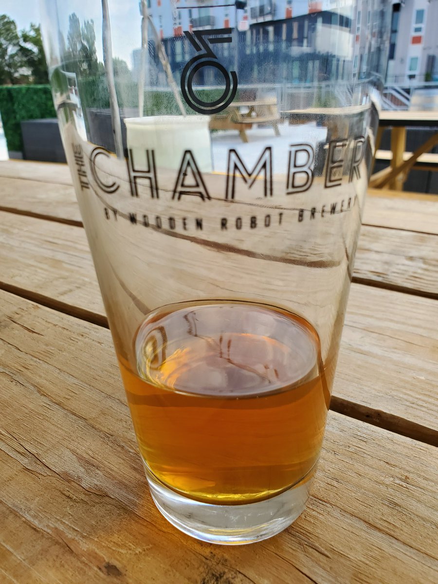 CampaignPod_Sam's tweet photo. Not a bad way to kill an hour on a Tuesday. Good Morning Vietnam (name of the beer) from @WoodenRobotAle on a roof in NoDa. My preferred beer for planning on how to kill my players. Kresh would've loved this one. #CampaignNotes #paizo #pathfinder2e https://t.co/7BBCSxcINA