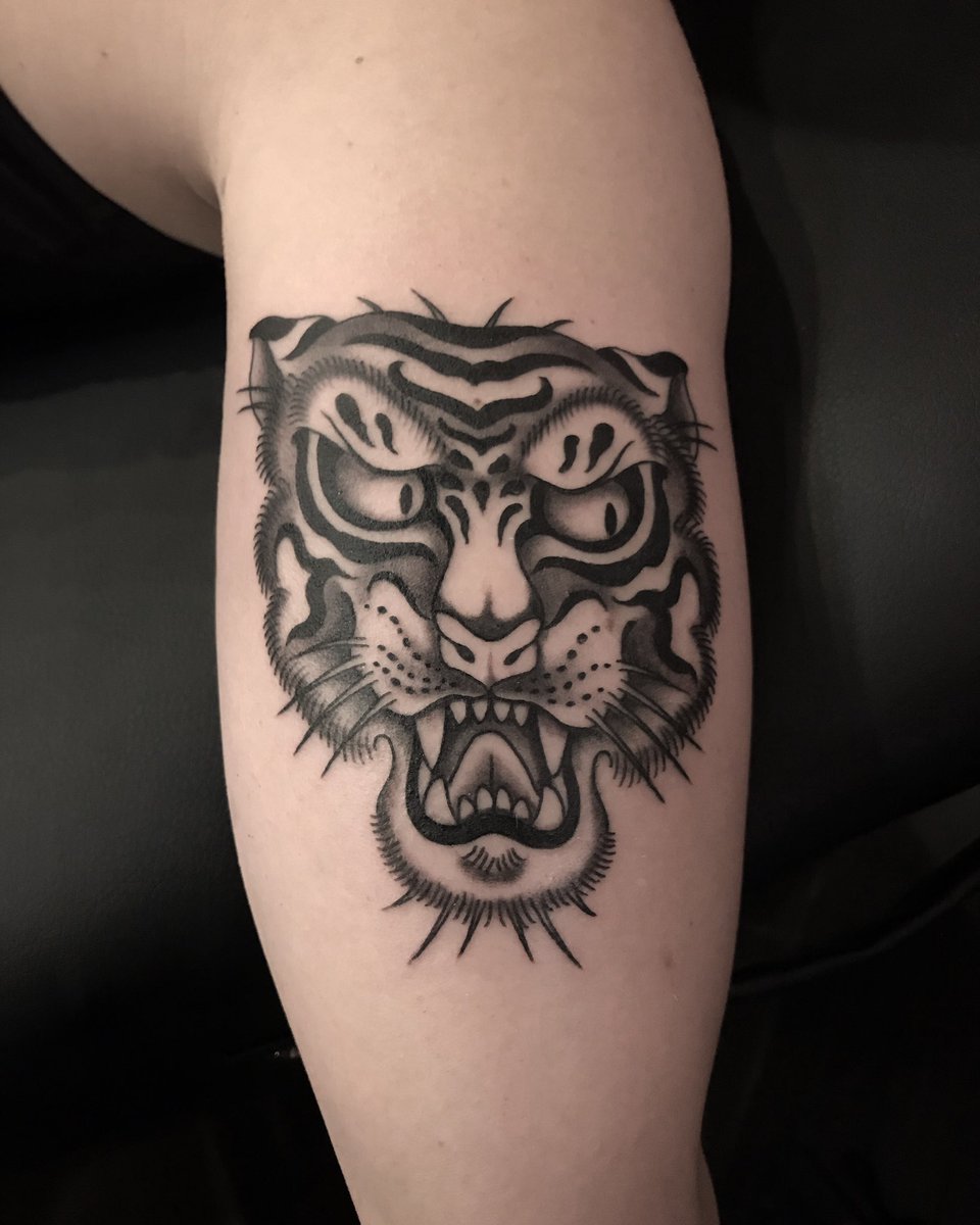 natefierro's tweet photo. Tiger head on the back of the upper arm. Been a while since my last tweet. Gonna try &amp; get some frequent twitter action going from now on. Follow on IG too! https://t.co/hozAxaDrhU &amp; also if you’d like to book an appointment visit https://t.co/3nd3XugfCw to send a request! https://t.co/V8oidyweQe