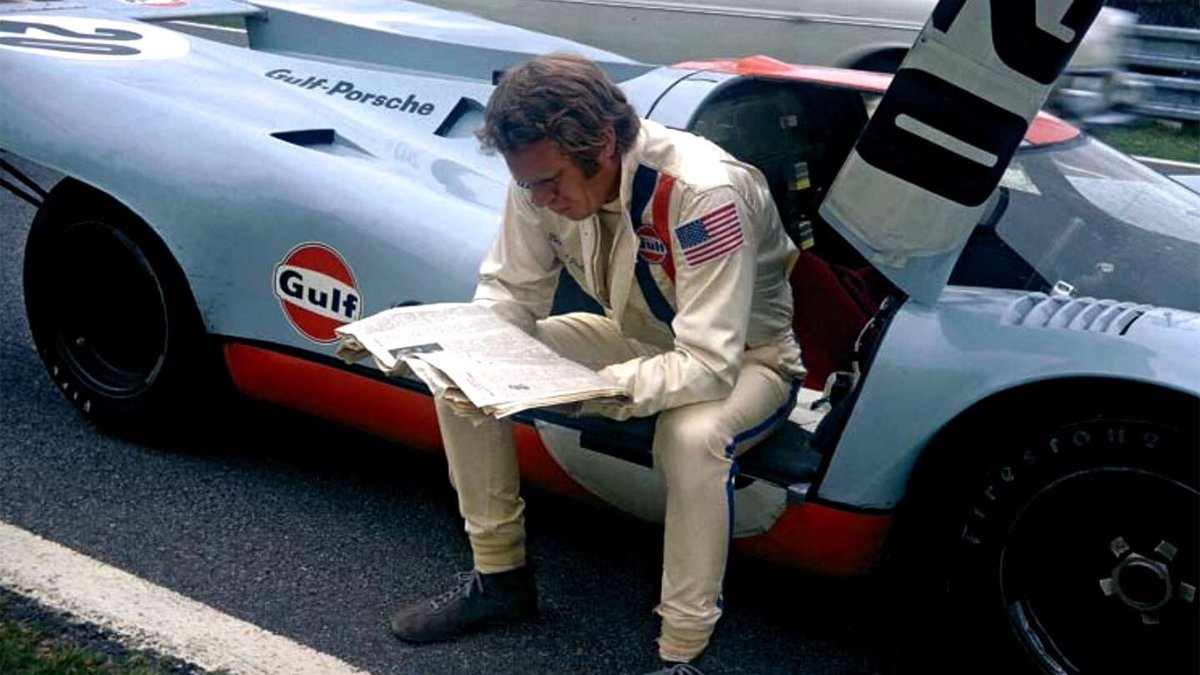 4SpeedShop's tweet photo. Happy 9/17! - Here’s @stevemcqueen chillin’ behind the scenes with his @porsche 917 on the set of “Le Mans” in 1970. One page of that script probably covered the dialog for the entire movie. 🏁 #notmuchtalking #justracing https://t.co/KIu7ZMSzT2