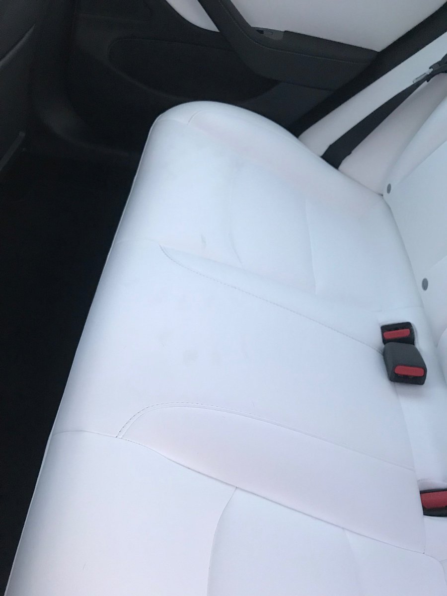 GiruloSpain's tweet photo. Worst experience with my tesla model 3 delivery. Car was dirty inside with white interior, trunk not closing well and bumper a bit off. Also i was promised a base performance, my license plate shows a performance, but got long range. However the car is great @elonmusk @Tesla https://t.co/3XRX6PfuIK