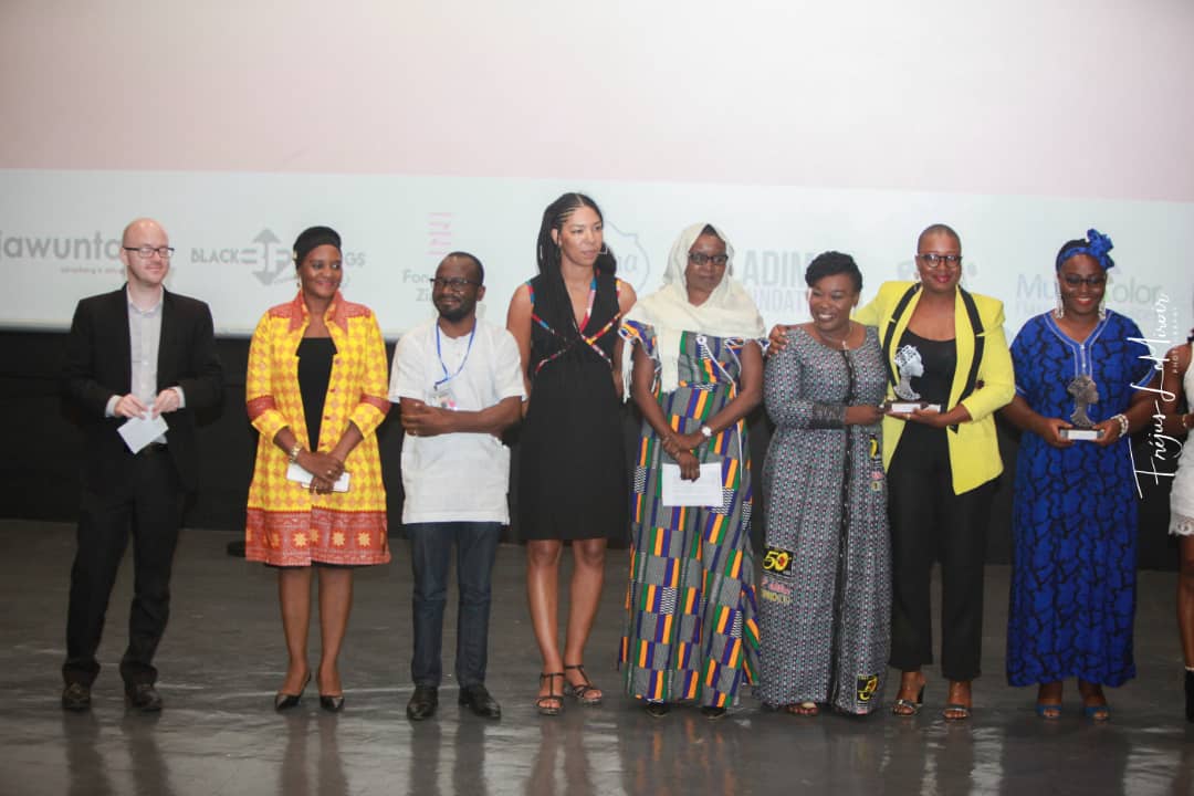 flore_tamko's tweet photo. Exit le FIFF Cotonou 2019
Le Cameroun s'en sort avec le prix AMAZONE DU JURY avec le film " Obscurité dans mon miroir" de Flore Tamko Mbensi,  une production de CORDIA PROD 
#Cinéma
#FIFFcotonou https://t.co/i0cBlzZlfF