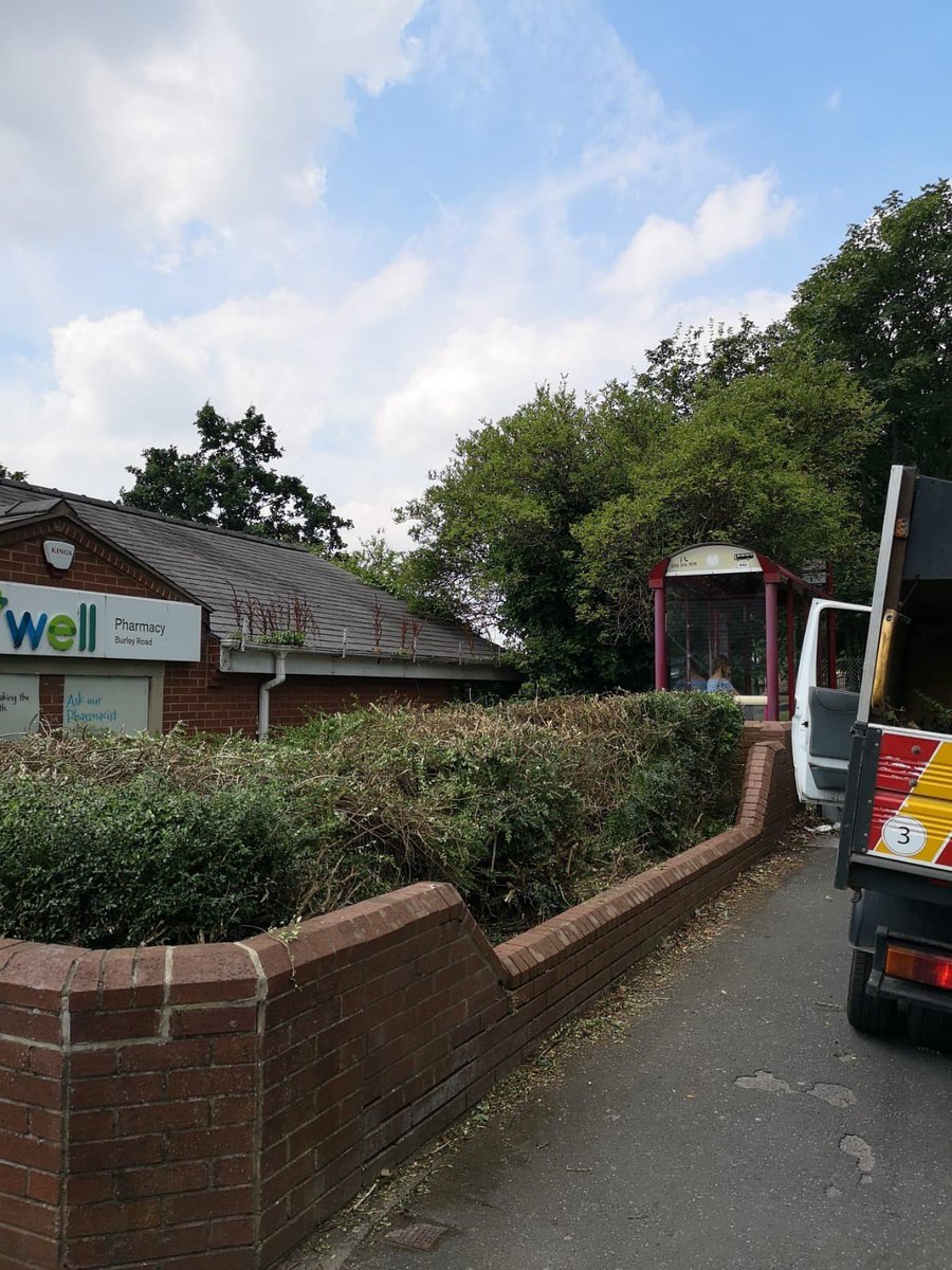 A couple of before and after photos of a hedge reduction, making the store &amp; hedge look tidier!