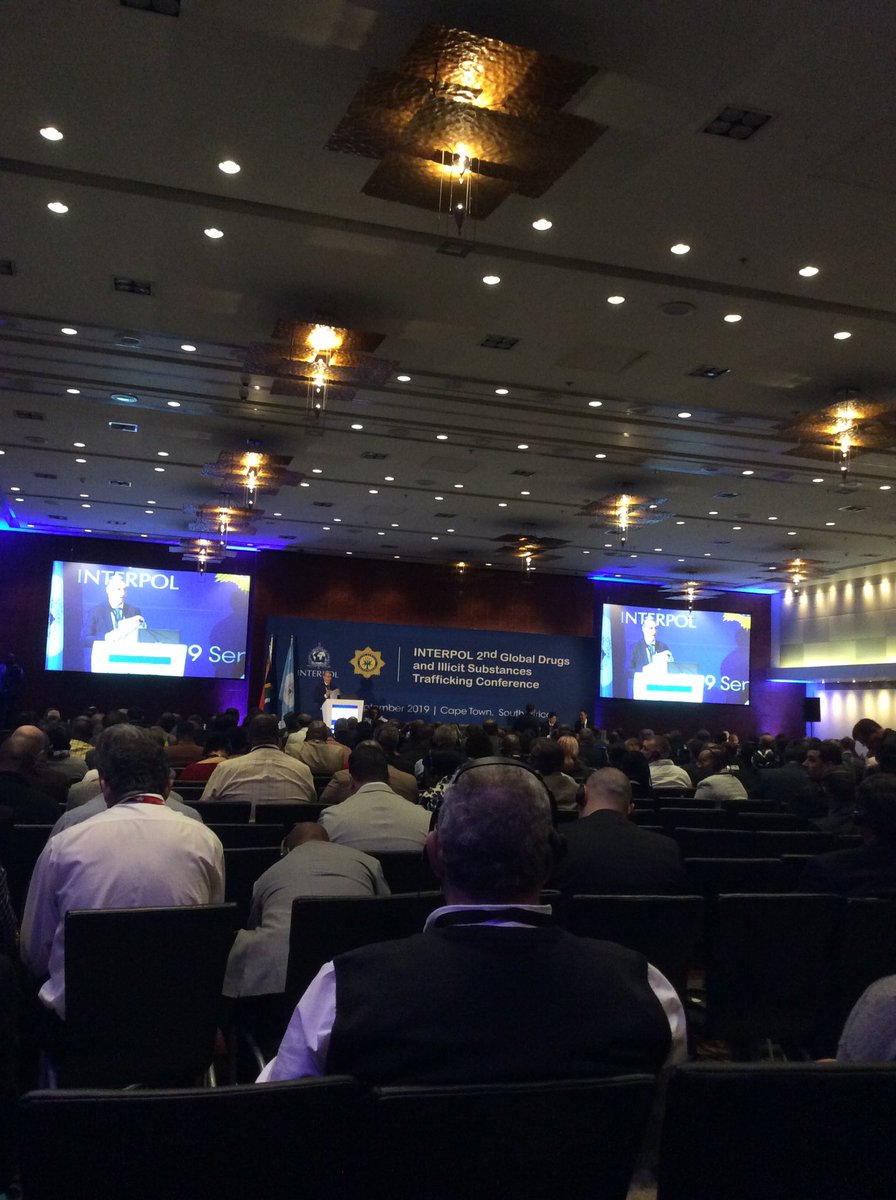 SAPoliceService's tweet photo. #sapsHQ #Interpol2ndGlobalConf Chair, José de Gracia &amp; #SAPS’ Sello Moerane on introduction of Day 3, Agenda. Speakers to present on #AirTrafficking; Cargo/Parcel post, passenger concealment, General Aviation and transit passengers. #DrugTrafficking. #Policing #LawEnforcement ME https://t.co/e83pv9dW0j