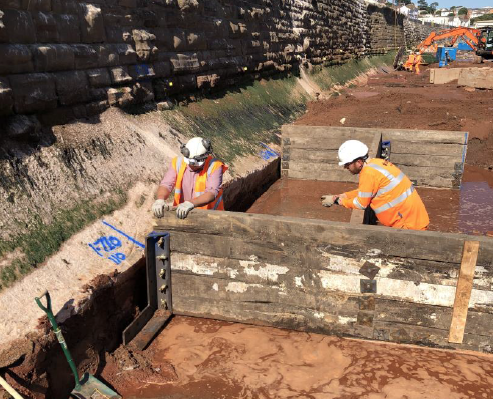 SouthWestRRP's tweet photo. 👷♂️🏗️Since work restarted at #Dawlish on 9 Sept, we've been busy excavating the toe of the sea wall in sections, creating temporary bays within which concrete can be poured to create foundations for the new sea wall. We're progressing well, but there's still a way to go. 🚄#SWRRP https://t.co/yFXRCHkRSK