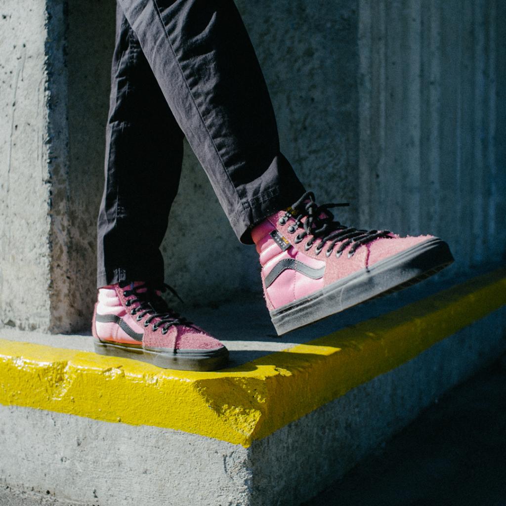 pink vans on feet
