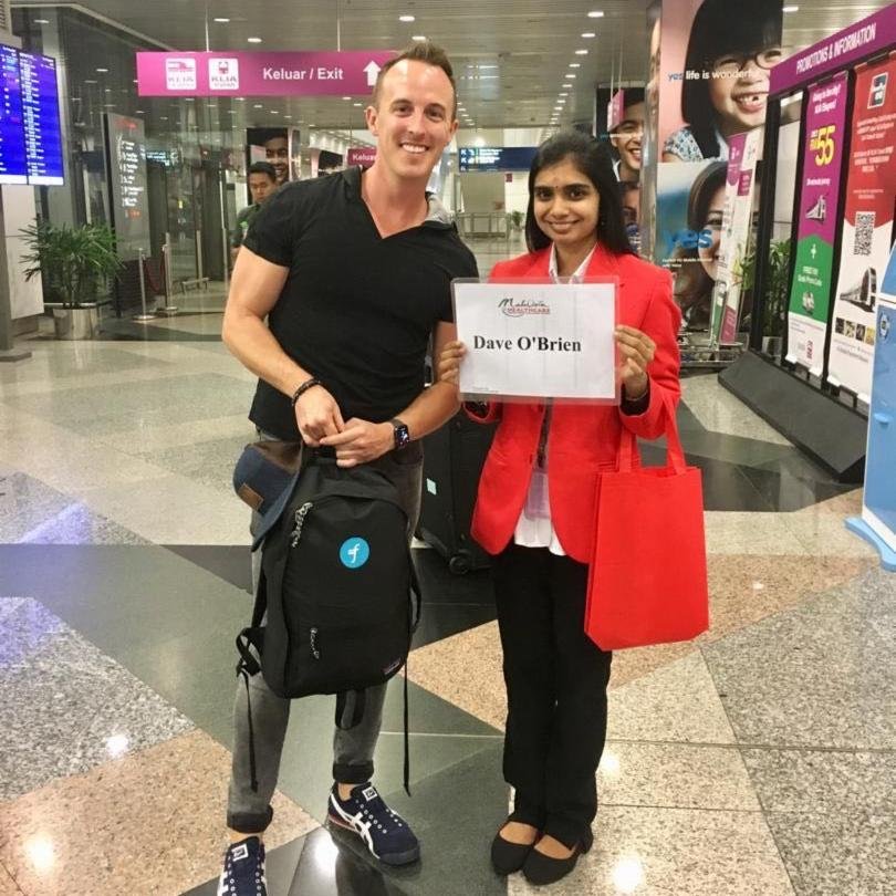 Flywire's tweet image. After a long flight from the US to Malaysia, a rep from @mhtcmalaysia kindly welcomes Dave, our Director of International Healthcare, at the Kuala Lumpur Airport. This is a service #MHTC offers to patients arriving from around the world! #healthcare #insigHT2019 #FlywireHealth