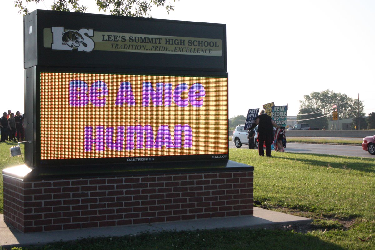 Supporters turned out to protest the hate speech of the Westboro Baptist Church on the <a href="/LeesSummitHS/">LSHS</a> campus this morning. Student groups wrote positive messages on the sidewalks of each entrance. The <a href="/LSPDPIO/">Lees Summit Police</a> kept students safe by redirecting traffic away from protests.