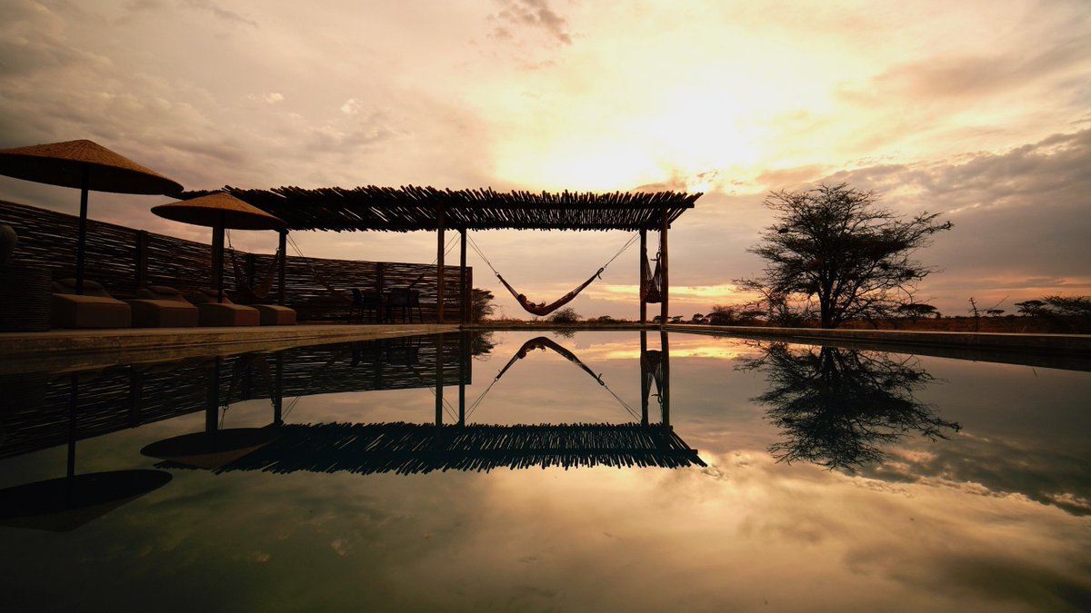 The best way to reflect on #humpday -at the new #pool at #asiliaafrica #namiriplains 
 
#winewednesday #winesday #womenwednesday
#tanzania #safari #reflection 
#swimming #holiday #travel #travelphotography #wednesday #wcw #wellnesswednesday #summer #hammock #fitness #africa