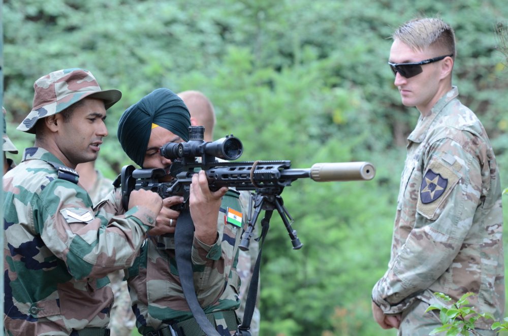 USPACOM's tweet photo. @USARPAC soldiers from @1SBCT_Ghost and @ADGPI soldiers familiarise themselves with the #M110 Semi Automatic Sniper System and #M2010 Sniper Rifle during #YudhAbhyas19@JBLM_PAO #partnersfriendsallies #readiness #lethality #FreeandOpenIndoPacific https://t.co/VisUl1XbC7