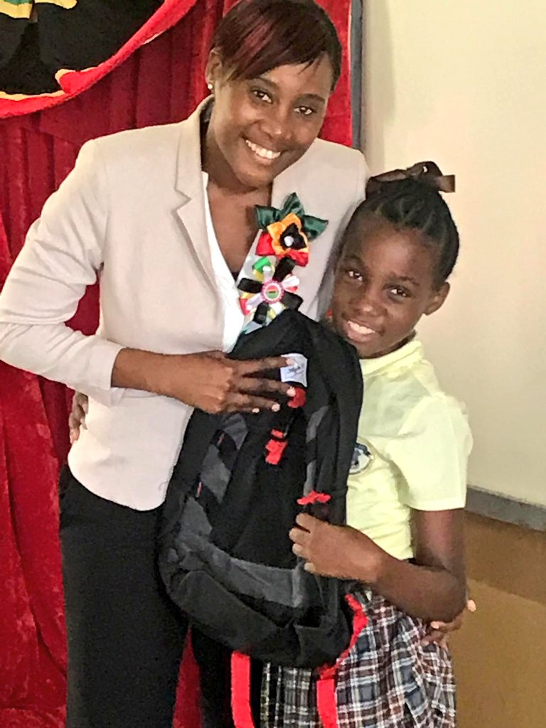 MinisterAkilah's tweet photo. As part of our patriotic programs I was delighted to present Bronte Welsh Primary #School with a check on behalf of #SCASPA to assist with various expenses for the school and to present Bronte Welsh with bag packs with school supplies. Dr. William Connor also received bag packs. https://t.co/jg2AC2uKr5