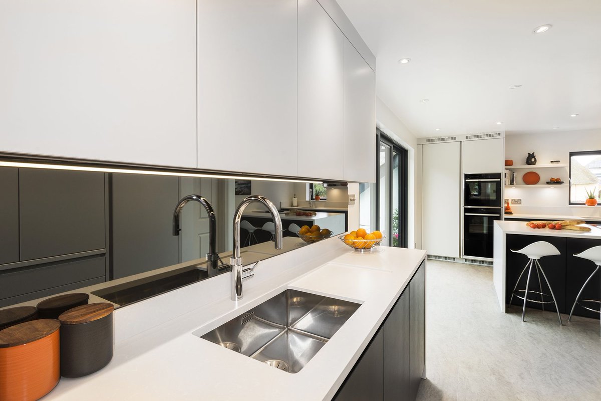 treyonekitchens's tweet photo. Sneak peek number two with this kitchen, we are loving the darkened Grey Mirror used as the backsplash in the prep area of this kitchen which makes this challenging space look so much bigger.
#glasssplashbacks #mirrorsplashbacks #bespokekitchens #kitchensdevon #kitchenscornwall https://t.co/1HrV2aXVip