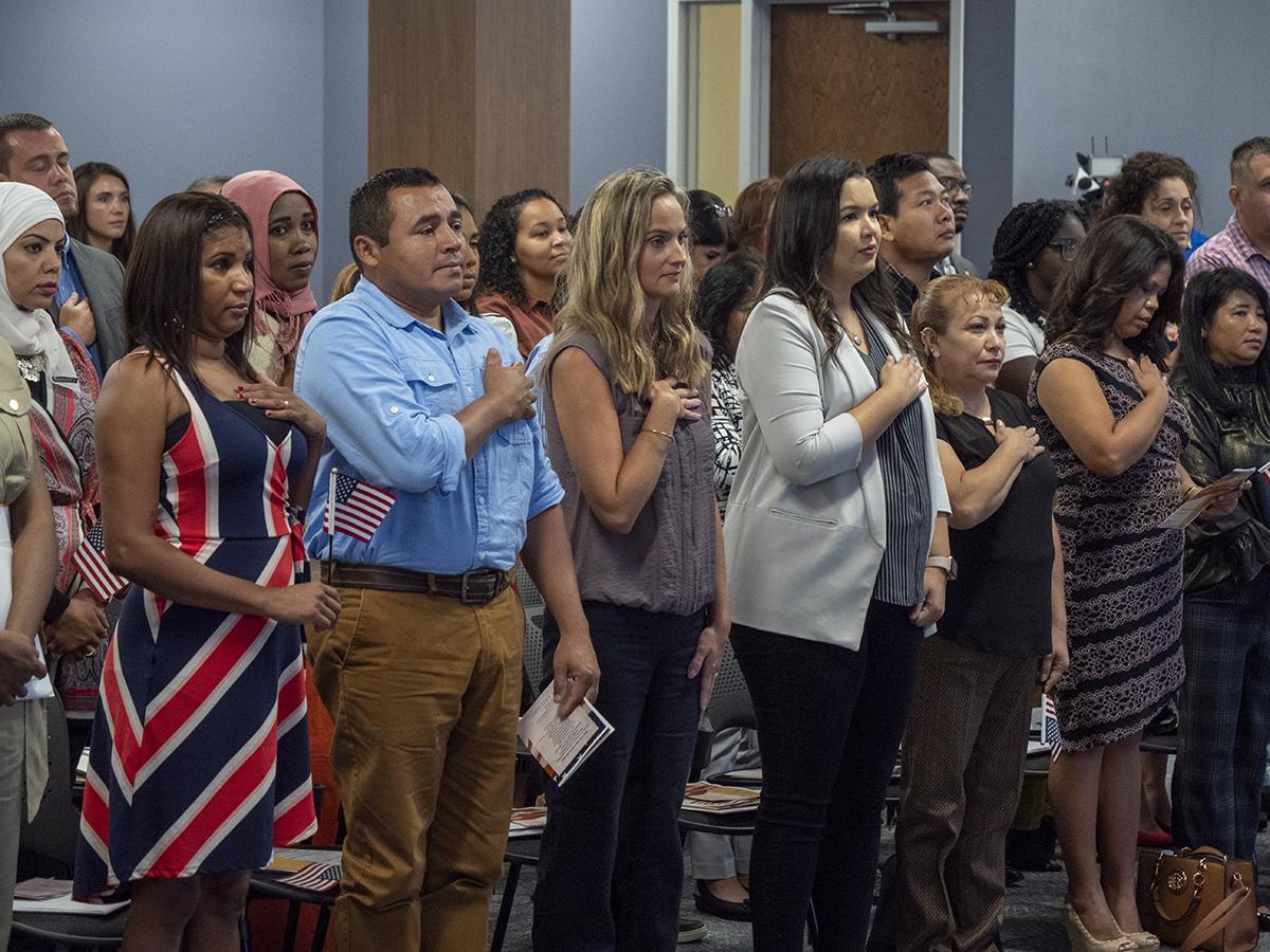 USCIS's tweet photo. Today, we’re opening the new location of our Charlotte field office, celebrating #ConstitutionWeek, and most importantly, welcoming 20 new U.S. citizens. Acting USCIS Director @USCISCuccinelli is in Charlotte, NC for these special events. #newUScitizen #WeThePeople https://t.co/u6CpZkkF7O