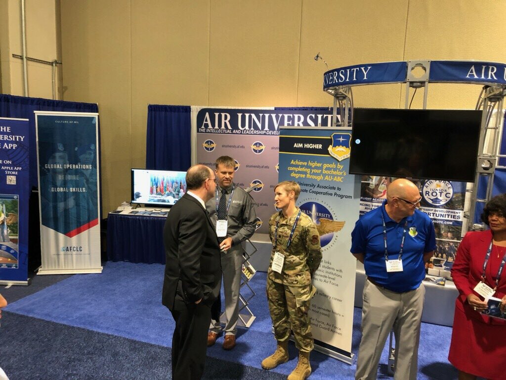 AFCLC's tweet photo. What an honor! Acting Secretary of the Air Force Matthew Donovan stopped by AU’s booth at AFA’s #ASPC19. We were so excited to tell him about all the amazing things AFCLC, LEAP and Air University has to offer. We even showed him our app!🌎 #afclc @ActingSecAF @HQAirUniversity https://t.co/iPG4RTSo16