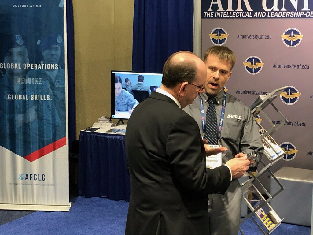 AFCLC's tweet photo. What an honor! Acting Secretary of the Air Force Matthew Donovan stopped by AU’s booth at AFA’s #ASPC19. We were so excited to tell him about all the amazing things AFCLC, LEAP and Air University has to offer. We even showed him our app!🌎 #afclc @ActingSecAF @HQAirUniversity https://t.co/iPG4RTSo16