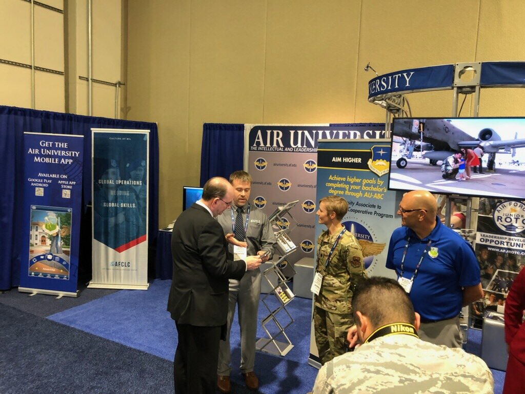 AFCLC's tweet photo. What an honor! Acting Secretary of the Air Force Matthew Donovan stopped by AU’s booth at AFA’s #ASPC19. We were so excited to tell him about all the amazing things AFCLC, LEAP and Air University has to offer. We even showed him our app!🌎 #afclc @ActingSecAF @HQAirUniversity https://t.co/iPG4RTSo16