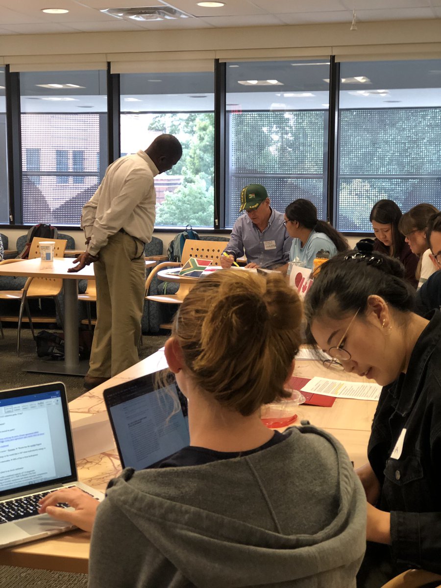 GGSDepartment's tweet photo. Dr. Komwa’s class participating in a simulation of the #parisclimateagreement in his Sustainable Development course. This activity gives students hands on experience to understand the role of geography and sustainability within global relations #MasonScience #MasonSolveX https://t.co/D7n9SuWmlQ