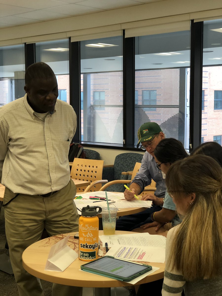 GGSDepartment's tweet photo. Dr. Komwa’s class participating in a simulation of the #parisclimateagreement in his Sustainable Development course. This activity gives students hands on experience to understand the role of geography and sustainability within global relations #MasonScience #MasonSolveX https://t.co/D7n9SuWmlQ