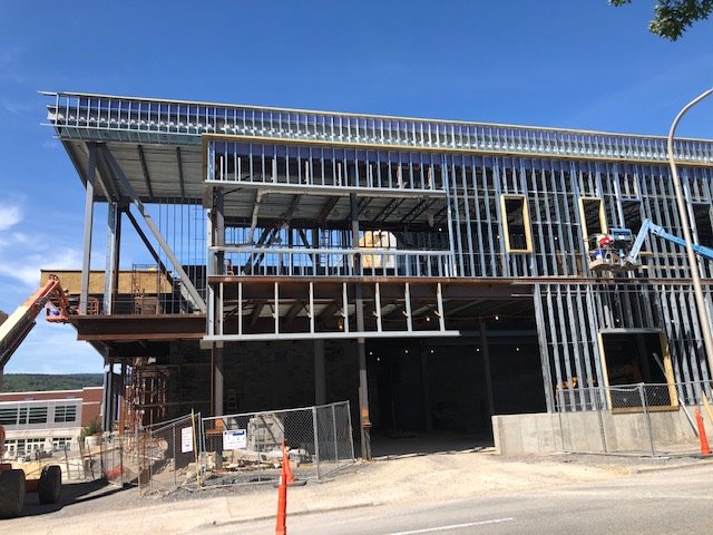 AASDSuper's tweet photo. The bridge across 6th Ave. and the side of the front entrance to the "B" building are moving along quite quickly. https://t.co/acE1ZrlGrX