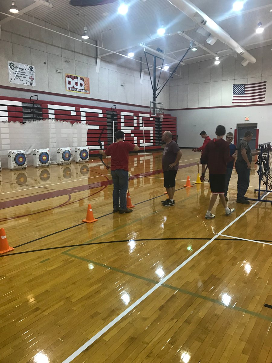 STJSchools's tweet photo. Middle School students sharpening their target practice skills during their Archery Unit. #stjtigerpride #learning #MoNASP https://t.co/5n8rOK33El
