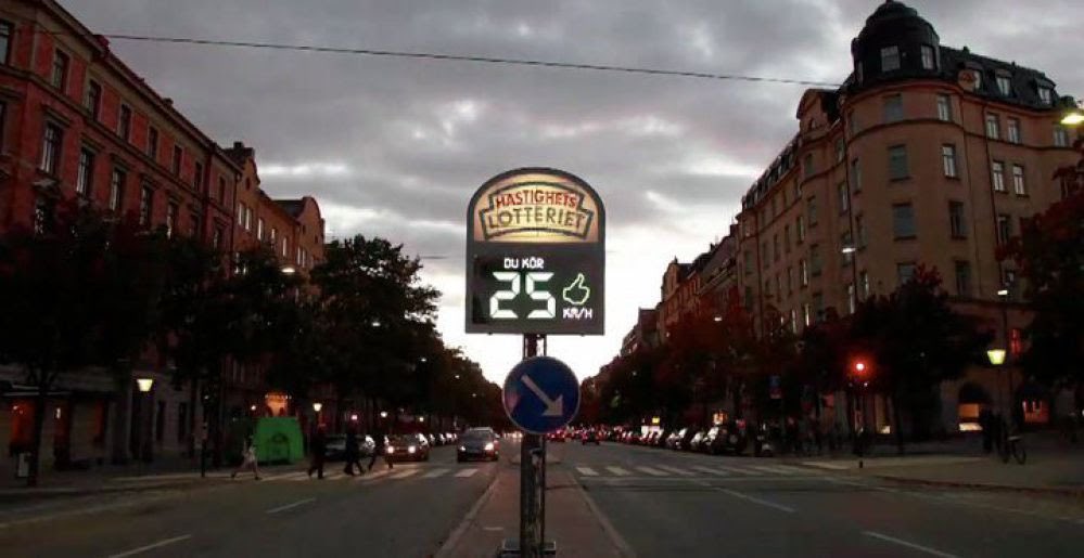 brent_bellamy's tweet image. Pilot project in Stockholm - photo radar cameras measure speed of passing cars. Those above the speed limit receive a fine. Those below are entered into a lottery for a chance to win a portion of the fines from speeders (up to $3000). Average speeds fell from 32km/h to 25 km/h.