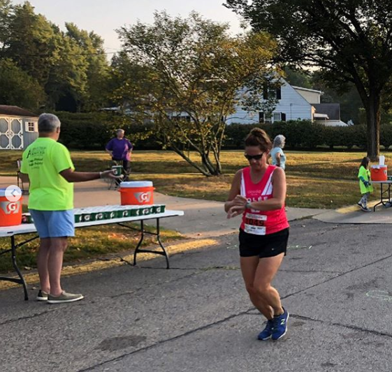 MotownMarathon's tweet photo. #TBT to race day and all of our amazing water station volunteers cheering on the runners at the 2019 Morgantown Marathon! We’re so thankful for your support. Many of our water stations are dedicated to a veteran and are filled with encouraging signs from the community! #RunMotown https://t.co/Wm2aa24LWF