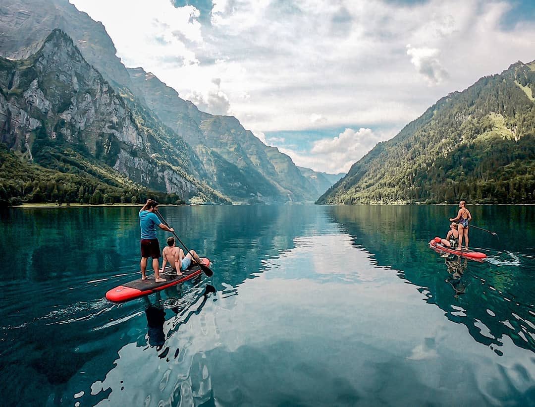aquamarinasup's tweet photo. The best adventures are shared with even better friends 🙌🏻! Who’s in your #SUPsquad? Crystal clear water shot by Instagrammer stojbi #ultimateSUP #paddleboarding #squadgoals #Switzerland https://t.co/mBT6OVU0qs