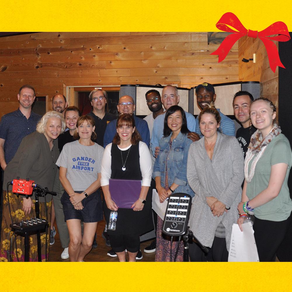 Come From Away cast smiling in the recording studio