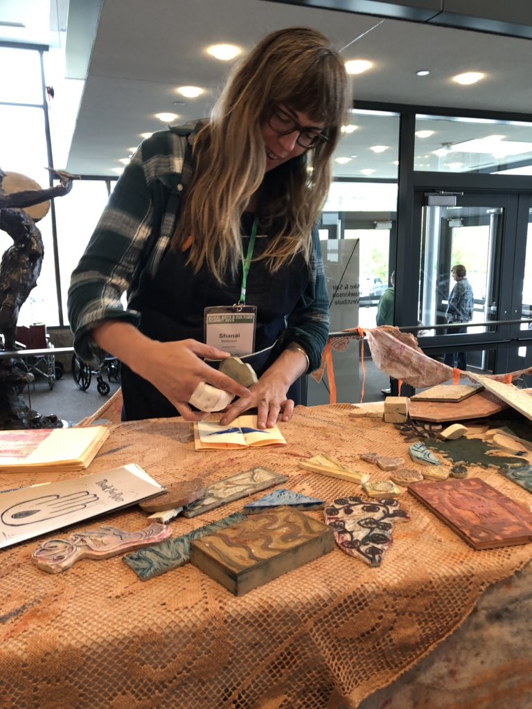 Artist @shanai_haana at her block printing station — sharing hand-stamped stories of region iron ranges &amp; cultures. She art-ed out so hard she injured her hand ☠️✊🌿 #racsummit