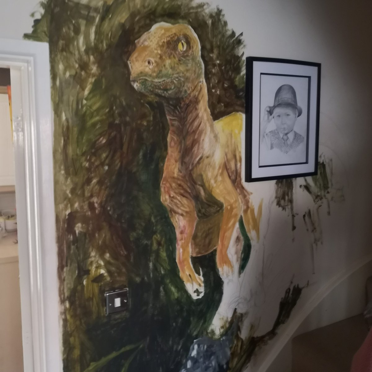 TheVernalls's tweet photo. Dinosaur painting finally taking shape, Acrylic painting on bottom of the stairs for a large murial linking different characters.   #acrylic #murial  #dinosaurart #dinosaur #jurassic #art #painting #wallpainting #artwall #creative #artcreation #acrylicart #thursday #painting https://t.co/3YQkvI7b07