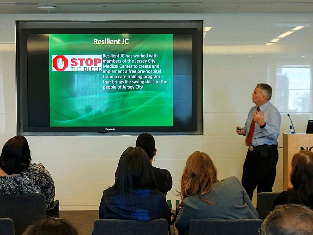 ResilientJC's tweet photo. The President of #ResilientJC, SImon Pereira Shorey, giving a talk to executives of Nomura Bank in Manhattan on the "Role of The Public In Disaster Resilience", which included a few words about the work of Resilient JC itself. https://t.co/IQzSaF7281