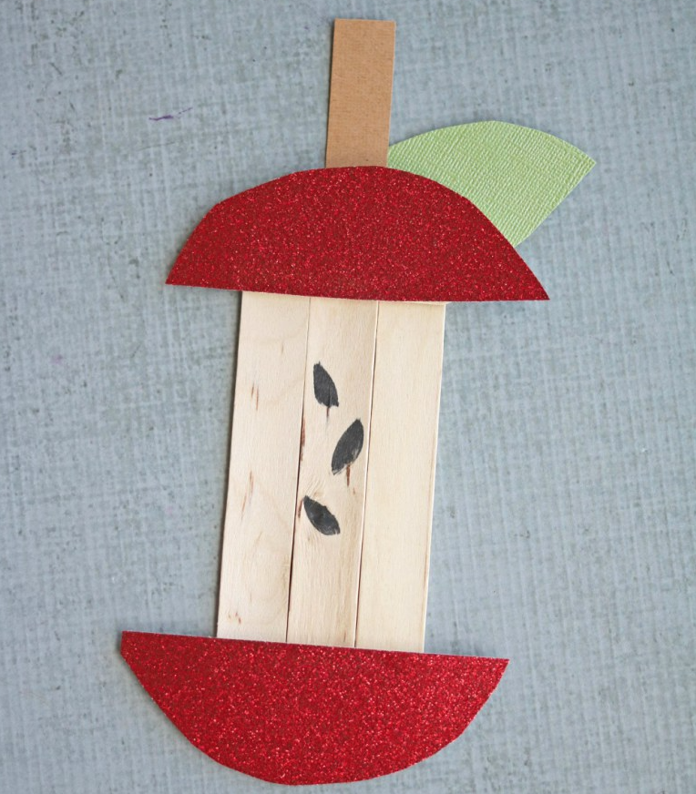 Feeling in the fall spirit? Check out this easy craft. All you need is construction paper, a marker, 3 popsicle sticks and a glue gun!