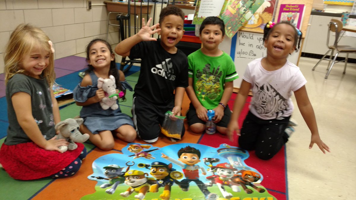 This group is so proud of their hard work and persistence to put together the puzzle