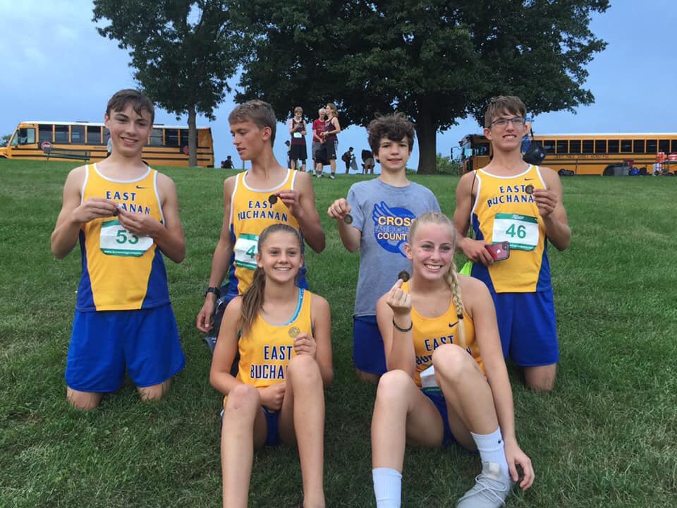 It was a warm night but we still managed to come home with 7 medals. Hannah snuck away before we could take our medal picture! Conrats to Laynie for getting first place in the girls varsity race!