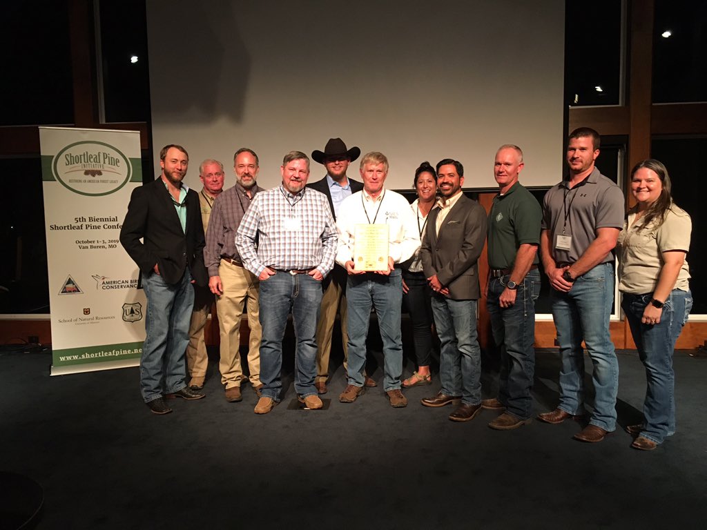 SLPInitiative's tweet photo. We presented the #ShortleafPine Conservation Award to the East Texas Shortleaf Pine Working Group, spearheaded by Mike Oliver of @NRCSTexas, for “distinguished contributions to the restoration and management of shortleaf pine forests, woodlands, and ecosystems.“ Great first day! https://t.co/CAzKasdtNY