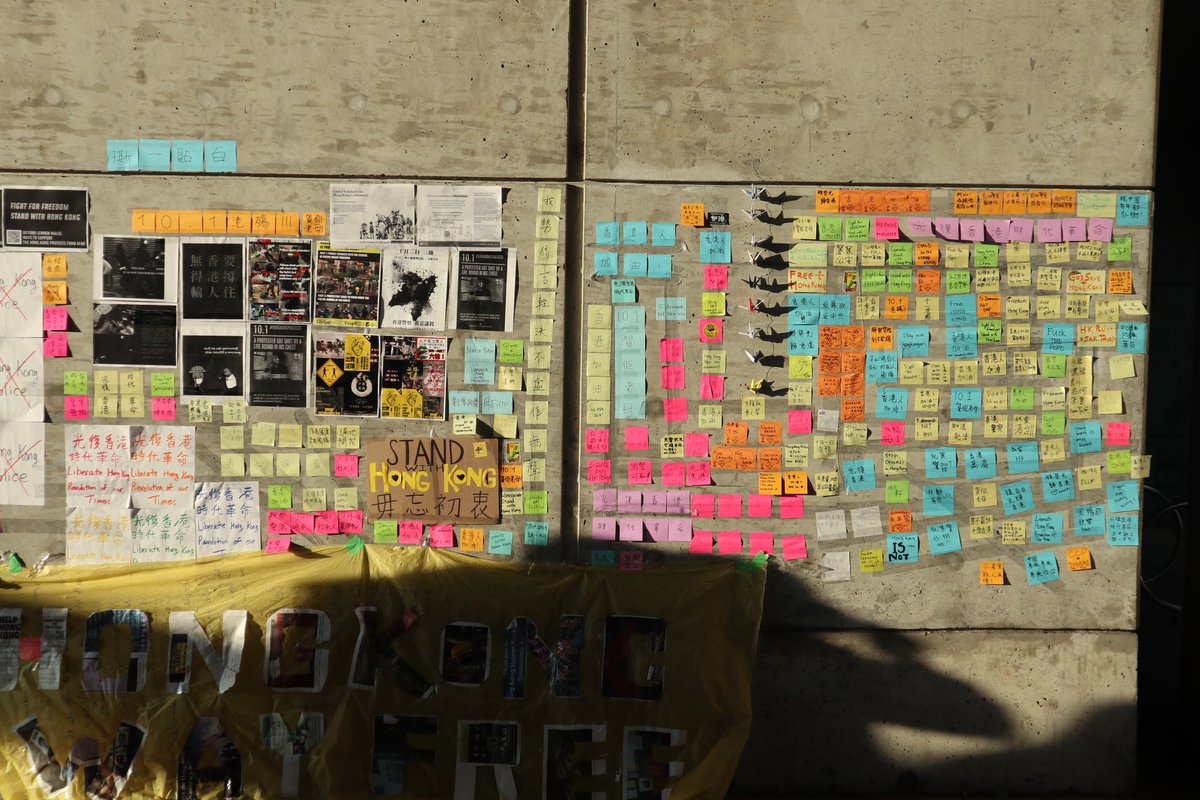 This is what the  #LennonWall at Aberdeen Station looked like before its destruction. It was constructed within an hour but didn't last long with nationalists already waiting to swoop in to wreck it.Guess what: the pro-HK people stayed and cleaned it all up after. Class act.