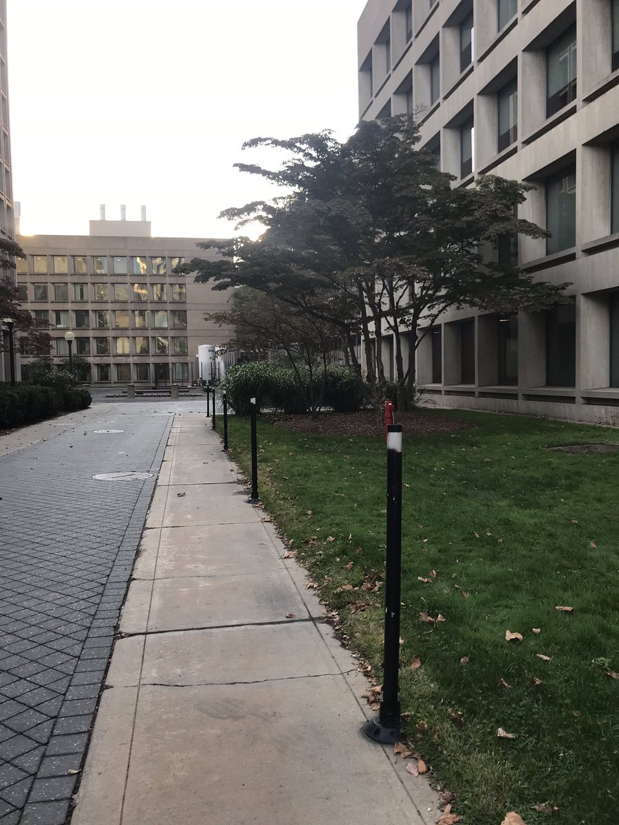 shu4603's tweet image. These black poles do not physically stop people from going onto the grass, but they serve as a waning to passerby to not cross. An example of architectural signs can be used to convey meaningful messages while preserving the #unityandflow of the campus space