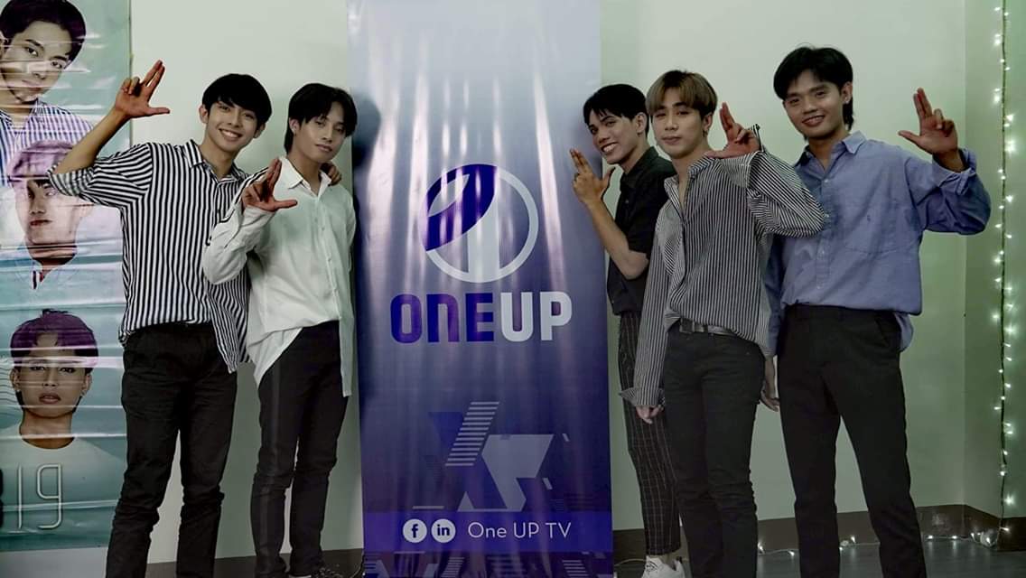OneUP tweet media