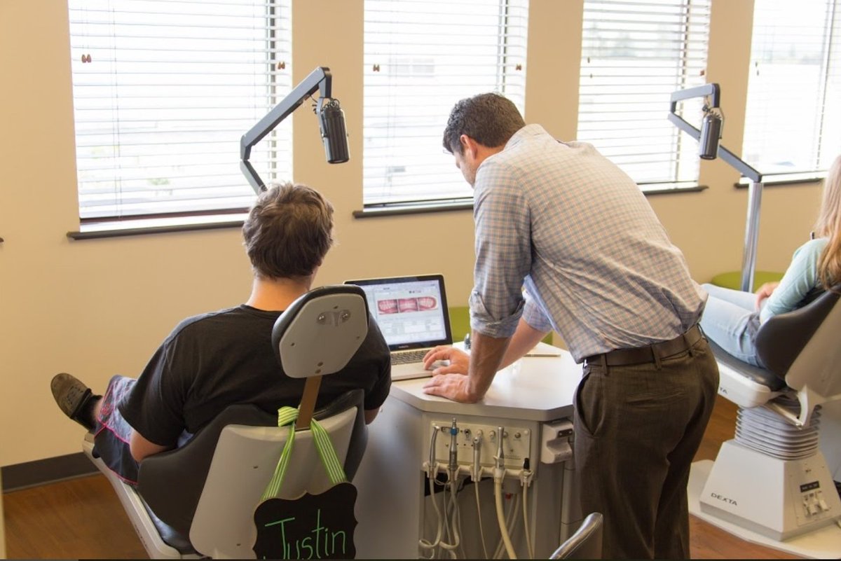 #SpokaneValley #orthodontist explaining #Invisalign treatment to #patient at DaBell &amp; Paventy #Orthodontics