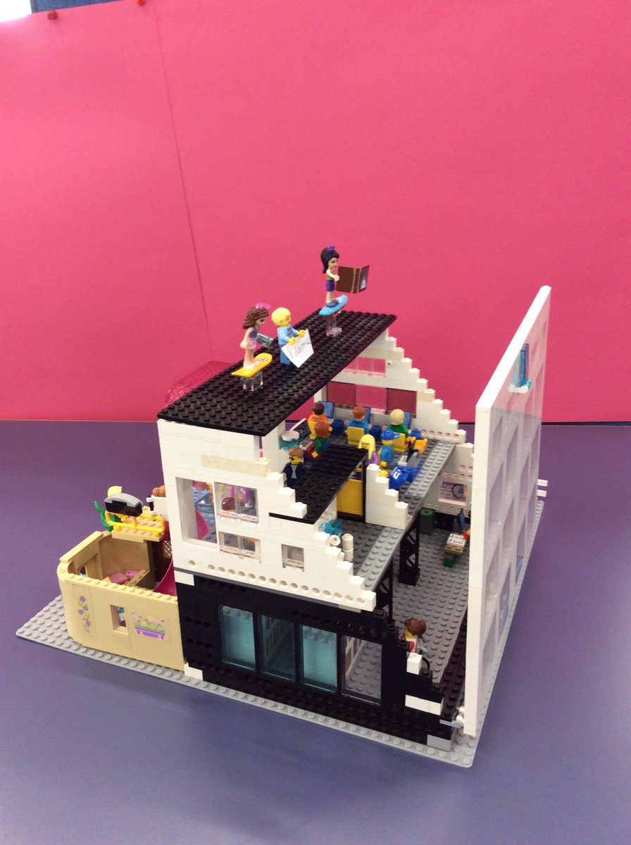 cambslib's tweet image. @LibrariesWeek Creators Lily &amp;amp; Jasmine say ‘libraries are all about having fun whilst reading. In this unique library scene there are friendly library staff on hover boards &amp;amp; of course a slide into a pool of books’ #LEGOLibrary #marchlibrary #2