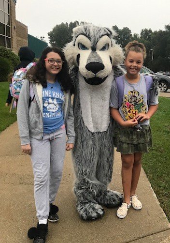 What a great way to start our school day....Walking to School with CHS Marching Band and "Wolfie"! #WalktoSchool, #WeAreClarkston, #PKETigers