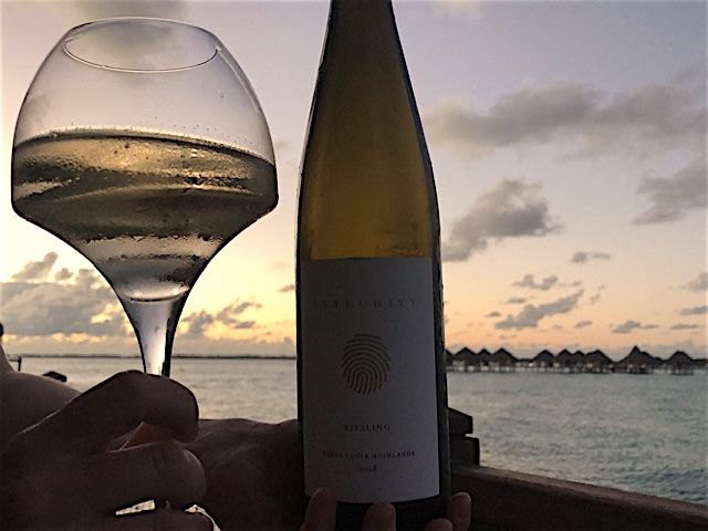 IntegrityWine's tweet photo. Our traveling wine bottles are back! Our Riesling Santa Lucia Highlands is sending vacation greetings from Bora Bora in French Polynesia. Thanks Emily &amp; Ian for making us jealous! #borabora #riesling #whitewine #travelingwine #vacationdrinks #integritywine https://t.co/QuiRhKAGfQ