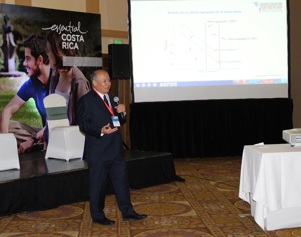 JohnRMcPhail's tweet photo. Dr. Fidel Reyes Lee, President of AUPRICA and Rector of the Universidad Rural de Guatemala @ururalgt, discusses how to use macroeconomic models and education systems to further develop communities. 

#HEP2019 #Partnership https://t.co/zDsGPqMbfc