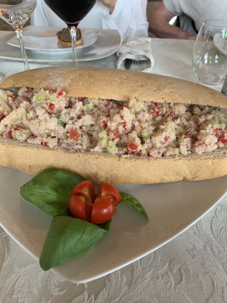 Panzanella, a Tuscan bread salad, made by a master.  It is refreshing and light, perfect for a warm day. #Tuscan #salad