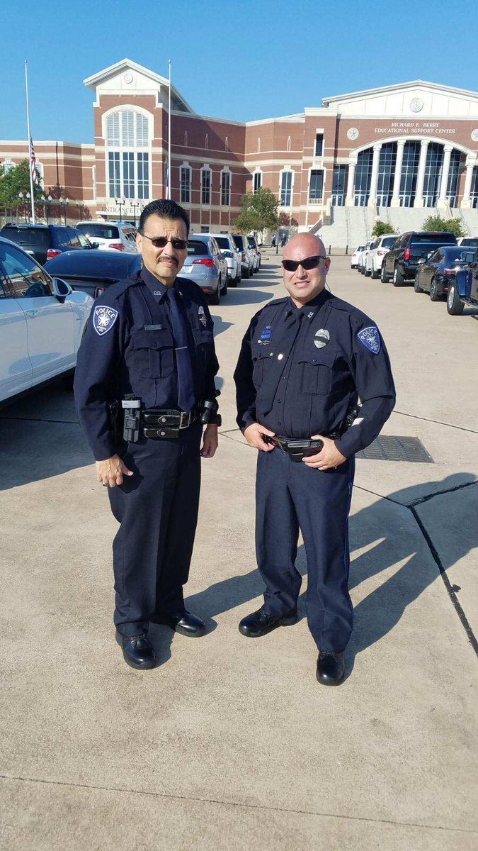 Spring_ISD_PD's tweet photo. Officer Fuente and Officer Mireles are representing the Spring ISD Police Department at the Celebration of Life for Deputy Sandeep Dhaliwal. Our continued thoughts and prayers are with the family. https://t.co/KBQ64o2Wvy
