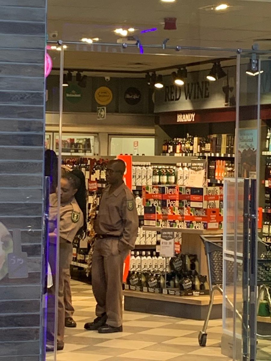 Abramjee's tweet photo. Via @annettedeppe  - Prison warders from Leeukop are seen at a bottle store in uniform buying alcohol. @DOJCD_ZA @RonaldLamola https://t.co/W3PgmSUosD